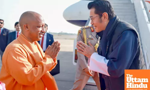 King of Bhutan Jigme Khesar Namgyel Wangchuck is welcomed by Uttar Pradesh CM Yogi Adityanath