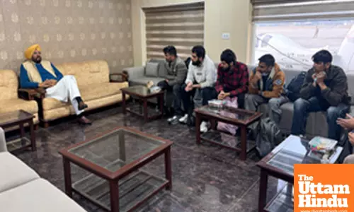 Punjab Minister Kuldeep Singh Dhaliwal meets deportees returning from the U.S. as part of a U.S. crackdown on illegal immigration