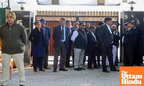 Anti Corruption Bureau (ACB) team leaves after being barred from entering the residence of AAP national convener Arvind Kejriwal