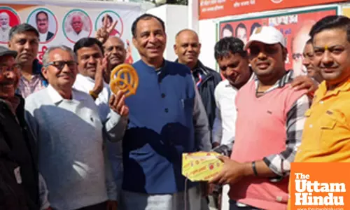 Haryana BJP President Mohan Lal Badoli celebrates the partys victory in the New Delhi elections