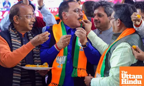 Delhi BJP President Virendra Sachdeva celebrates the partys victory in the State Assembly elections