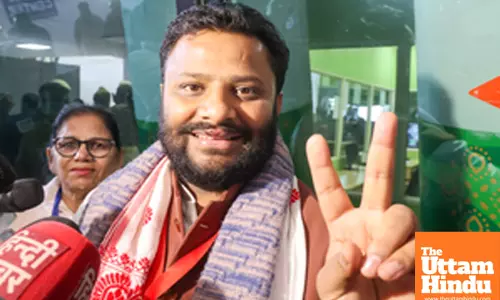 AAP candidate Kuldeep Kumar celebrates after his win in the Delhi Elections