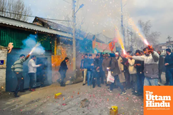 BJP workers burst crackers to celebrate the partys victory in the Delhi Assembly elections BJP workers burst crackers to celebrate the partys victory in the Delhi Assembly elections