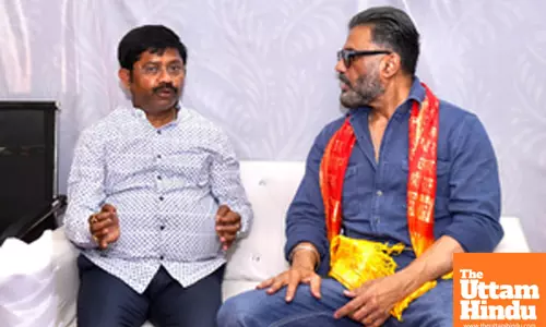 Actor Sunil Shetty with Minister for Export Promotion of Uttar Pradesh Nand Gopal Gupta during his visit to Maha Kumbh Mela