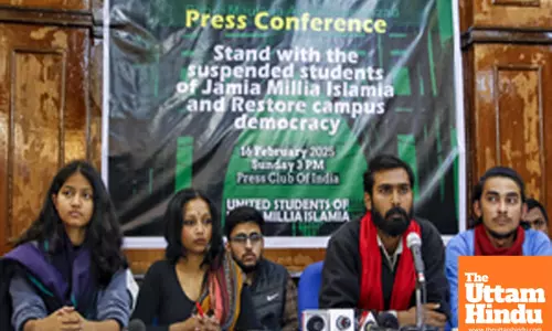 Members of the United Students of Jamia Millia Islamia address a press conference