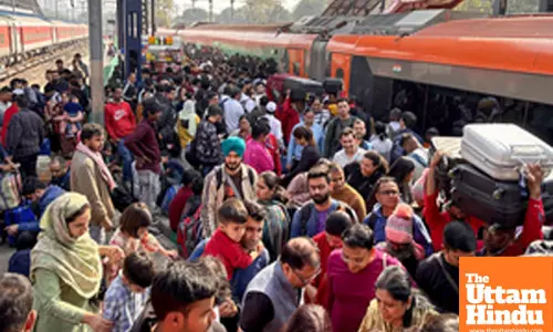 A crowd of passengers at the New Delhi railway station