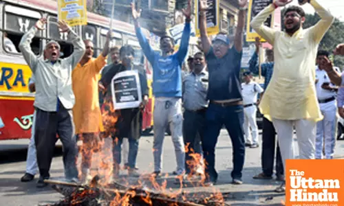 Congress activists take part in a protest rally against Union Rail Minister Ashwini Vaishnaw