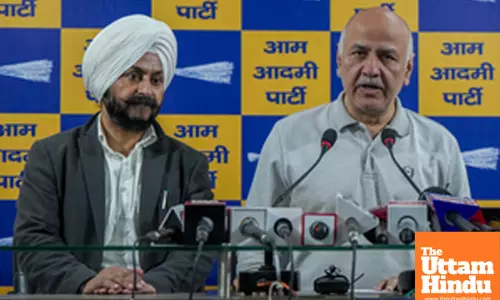 AAP leader Manish Sisodia with Tilak Nagar MLA Jarnail Singh addresses a press conference at AAP headquarters