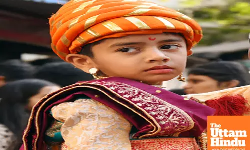Children dressed in traditional costumes participate in the 395th birth anniversary celebrations of Chhatrapati Shivaji Maharaj