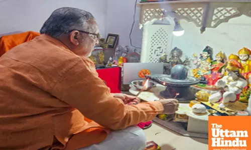 Uttar Pradesh cabinet minister Suresh Kumar Khanna offers prayers at his residence
