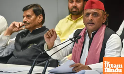 Samajwadi Party chief and MP Akhilesh Yadav addresses a press conference at the party office