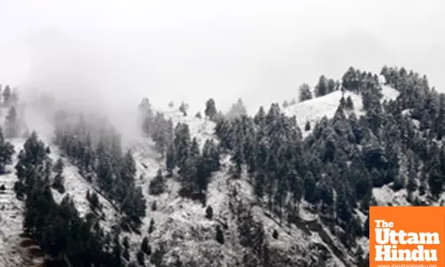 Title : Baramulla: Mountains receive fresh snowfall and rain showers sweep the plains