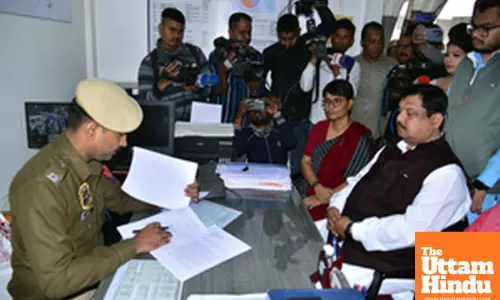 Congress leader Rakibul Hussain arrives to file an FIR