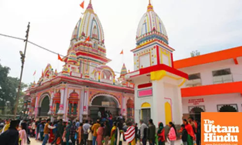 Devotees stand in a queue to offer prayer at Daksheshwar Mahadev Temple