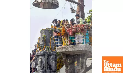 Devotees offer prayer at Shiv Mandir