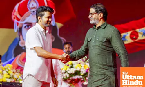 Actor-politician Vijay with Jan Suraj Party chief Prashant Kishor during TVKs first-anniversary event