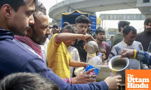 Devotees distributes Prasad on the occasion of Maha Shivratri