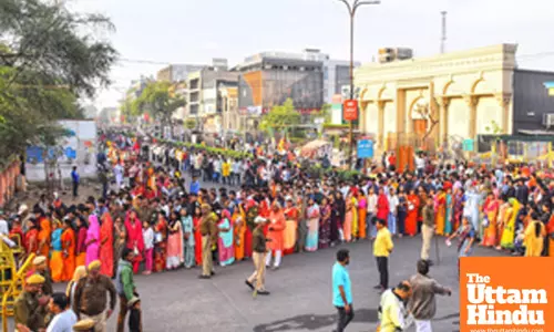 Devotees stand in a queue to offer prayer at Jharkhand Mahadev Temple