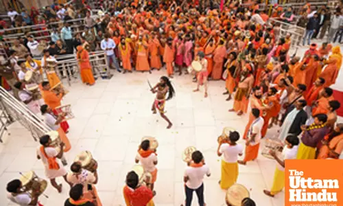 Naga sadhus gather to express their devotion and offer prayer