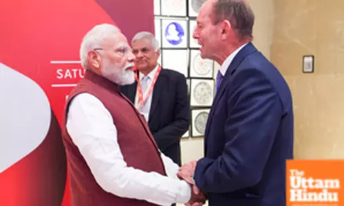 Prime Minister Narendra Modi meets Adviser to the UK Board of Trade Tony Abbott