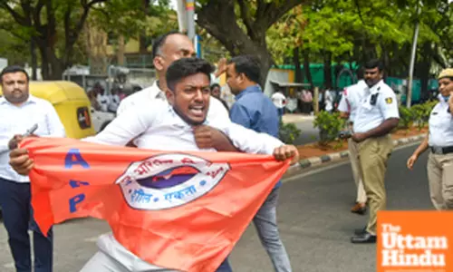 Members of ABVP stage a dharna to protest against the state government