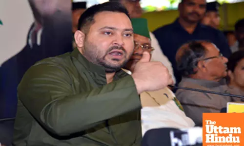 RJD MP Tejaswi Yadav addresses a press conference