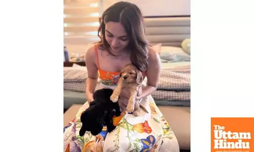 Kiara Advani radiates happiness while playing with puppies during pregnancy