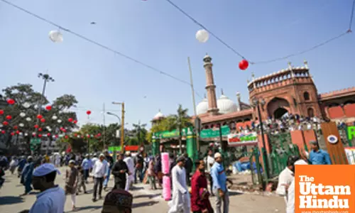 Devotees walk outside Jama Masjid after offering the first Friday namaz during the holy month of Ramadan