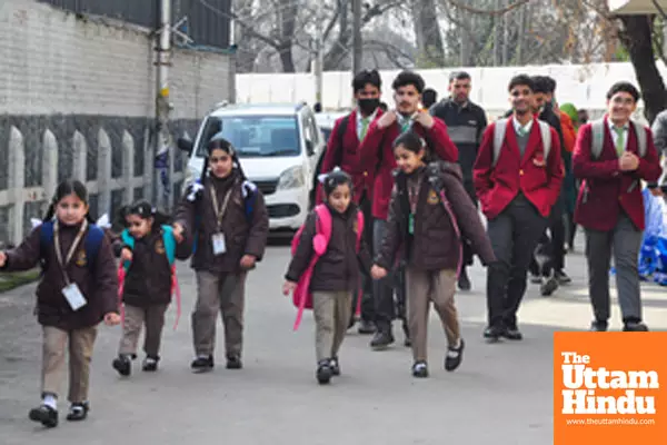 Students arrive at school to attend the first day of classes after a three-month winter vacation Students arrive at school to attend the first day of classes after a three-month winter vacation
