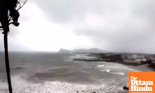 Tropical cyclone weakens to low though more Australian homes suffer power outages