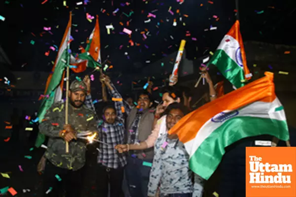Cricket fans celebrate after India won the ICC Champions Trophy final against New Zealand played at Dubai Cricket fans celebrate after India won the ICC Champions Trophy final against New Zealand played at Dubai