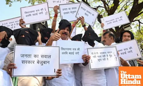 Congress legislators protest at the Gandhi statue