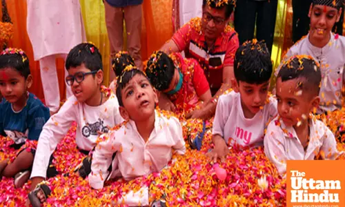 Children with cerebral palsy celebrate Holi