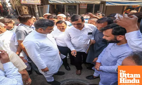 Title : New Delhi: Delhi Minister Parvesh Verma inspects Trinagar, orders sewer cleanup