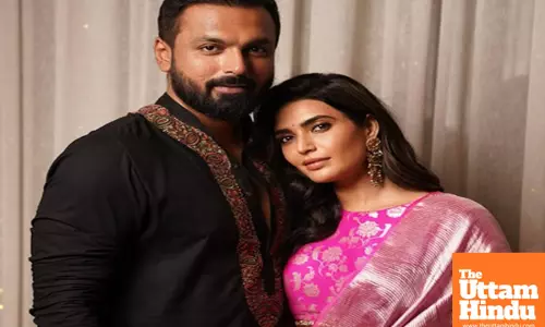 Karishma gets into a bicep flexing competition with hubby Varun Bangera