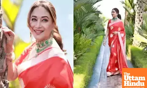 Madhuri Dixit radiates a golden glow in saree