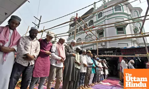 Muslim devotees offer namaz