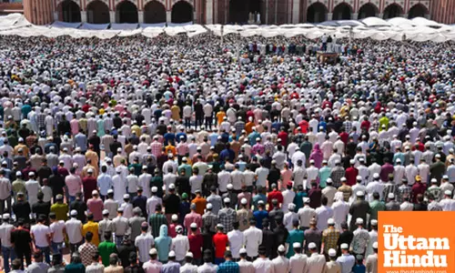 Muslim devotees offer namaz