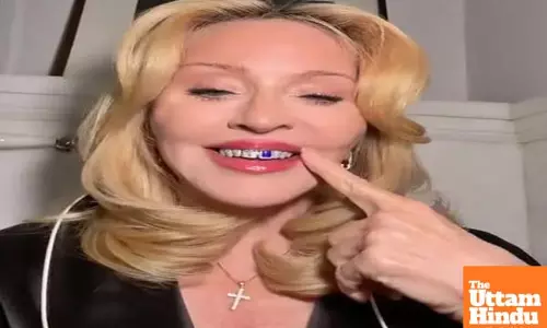 Madonna rocks new shimmery mouth jewellery