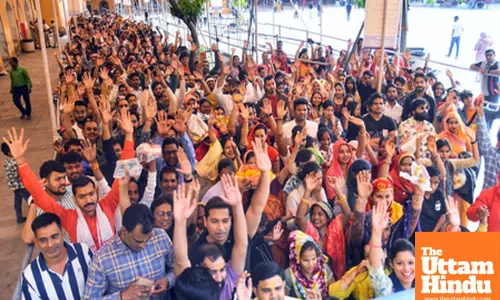 Devotees gather at the famous Shila Mata Temple