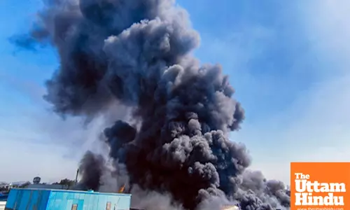 Smoke billows out as a massive fire engulfs Ektech 3