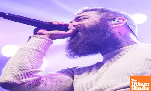 Post Malone, rumored girlfriend share passionate kiss during Paris trip