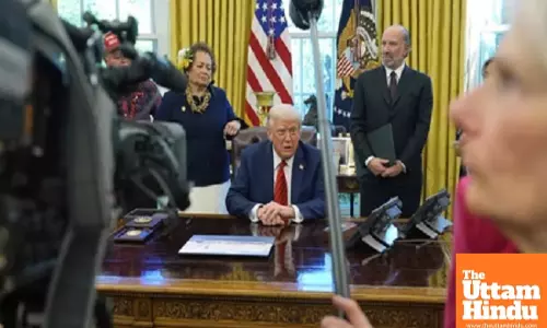 Trump signs memo to extend federal hiring freeze through July: White House