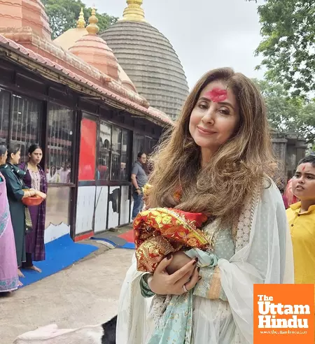 Urmila Matondkar offers prayers at the Kamakhya Temple amidst heavy rains