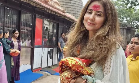 Urmila Matondkar offers prayers at the Kamakhya Temple amidst heavy rains