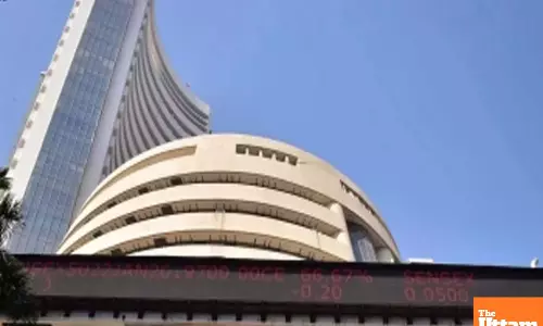Sensex, Nifty end with slight gains as investors remain cautious