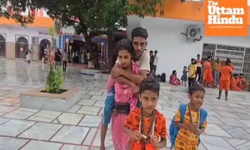 Devotion Redefined: Wife Carries Husband to Haridwar, Touching Millions With Her Act of Love