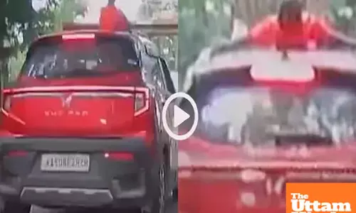 Dangerous Fun: Childs Head Hits Overhead Barrier While Standing in Car Sunroof, Watch Video