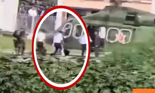 Oli boards military helicopter, destination unknown after quitting as PM