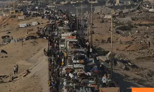 Fire rains down in Gaza, 20,000 Palestinians flee overnight fearing ground attack, 28 killed